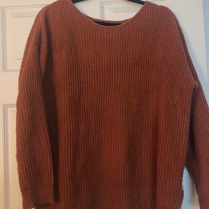 dark orange sweater